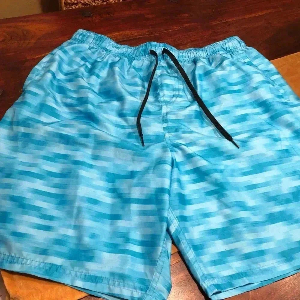 Two pairs of men’s swim shorts/with lining pre-owned size L, and XL
